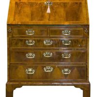 A Queen Anne walnut and feather banded bureau