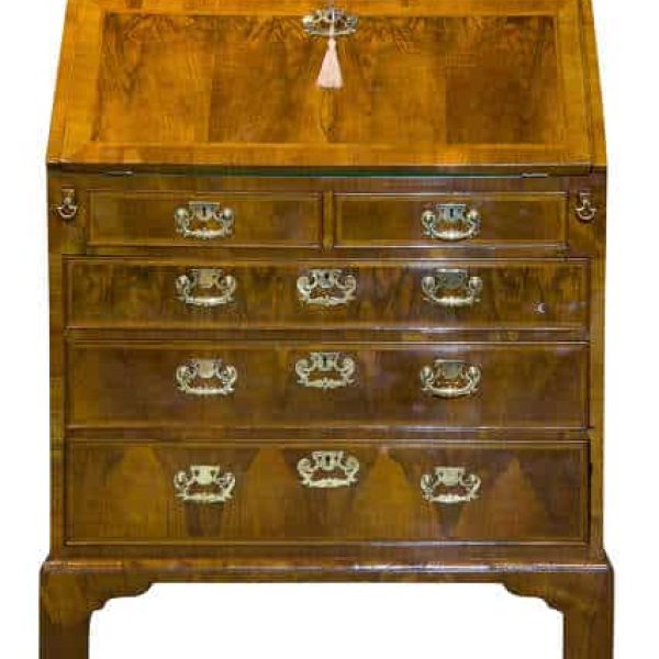 A Queen Anne walnut and feather banded bureau