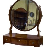 A rare Regency Bow Fronted Box Base Mirror