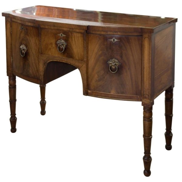 A William IV mahogany bow fronted sideboard