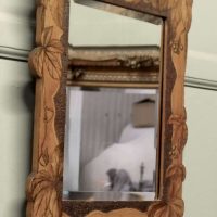 An Arts and Crafts Poker Work Wall Mirror