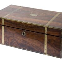 An early 19th Century brass bound rosewood writing box