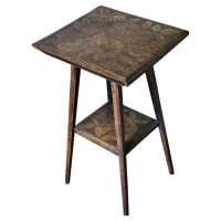 An Edwardian Carved Oak Etagere or Occasional Table