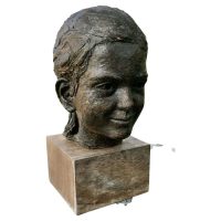 Artist’s Terracotta Bust of a Girl with a Pony Tail This is a hand ma