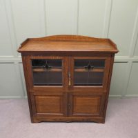 Arts and Crafts Oak Stained Glass Bookcase.