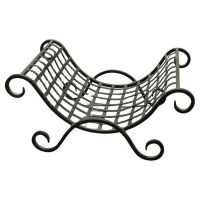 Attractive Cast Iron Log Carrier This is a great piece, it is made in iron and curved to