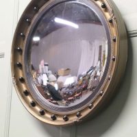 Gilt and Lacquer Regency Style Convex Wall Mirror