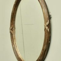 Large Gilt Oval Wall Mirror This Mirror has a 1.5” wide moulded oval frame which has an a