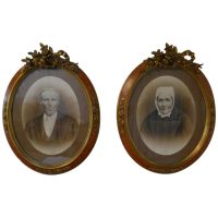 Pair of Large Portrait Photographs in Oval Ormolu Frames