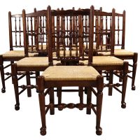Set of 8 Oak Spindle Back Dining Chairs Including Two Carvers 20thc