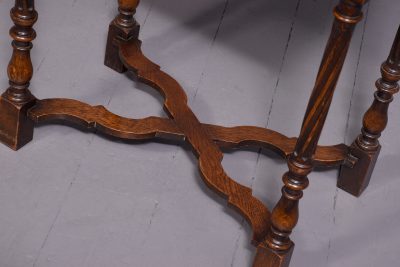 Neat-sized Jacobean-style, oak side table/fold-over games table - Image 9