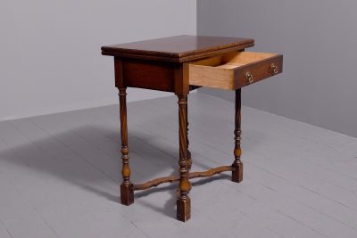 Neat-sized Jacobean-style, oak side table/fold-over games table - Image 3